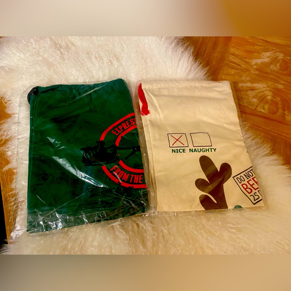 Brand new Sealed Duo Santa Totes-Sacks with expressive graphics!!!